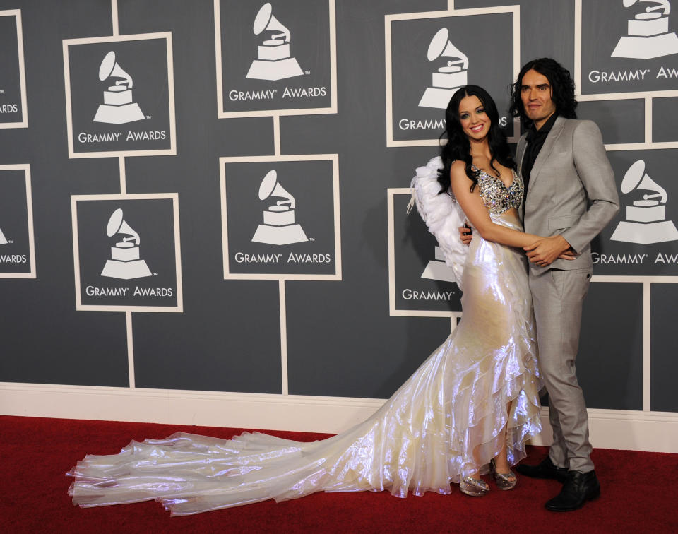 Russell and Katy in silver-toned garb