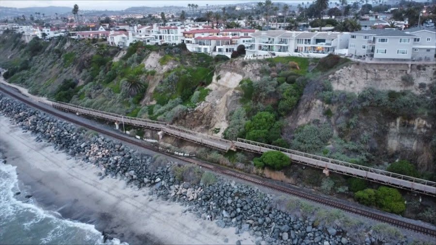 San Clemente landslide sends boulders onto tracks, stalling passenger