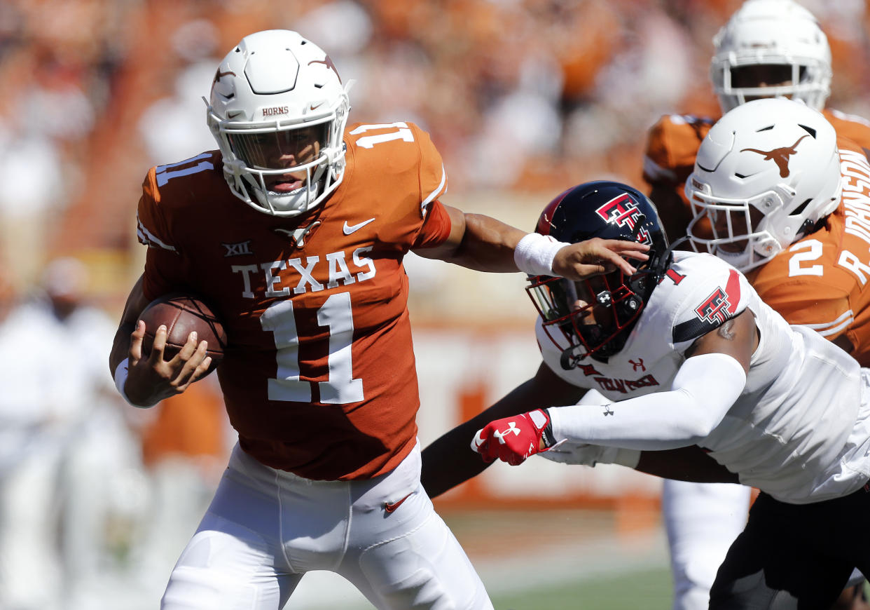 AUSTIN, TX - SEPTEMBER 25: University of Texas Long Horns Casey Thompson (11) runs the ball during the game against  the Texas Tech Red Raiders on September 25, 2021, at Darrell K Royal - Texas Memorial Stadium in Austin, TX. (Photo by Adam Davis/Icon Sportswire via Getty Images)