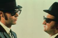 Unterwegs im Auftrag des Herrn: Als "Blues Brothers" (1980) wurden John Belushi (rechts) und Dan Aykroyd zu Stars und ließen die Herzen von Film- und Musikliebhabern höher schlagen.