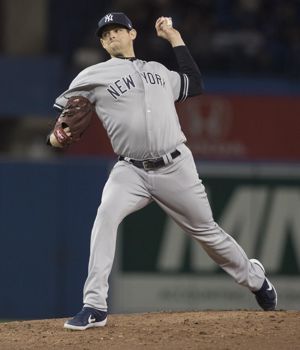 New York Yankees pitcher Jordan Montgomery throws against the Toronto Blue Jays during the second inning of a baseball game in Toronto, Sunday, Sept. 15, 2019. (Fred Thornhill/The Canadian Press via AP)