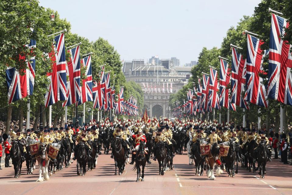 <p>The procession makes its way through the streets of London.</p>