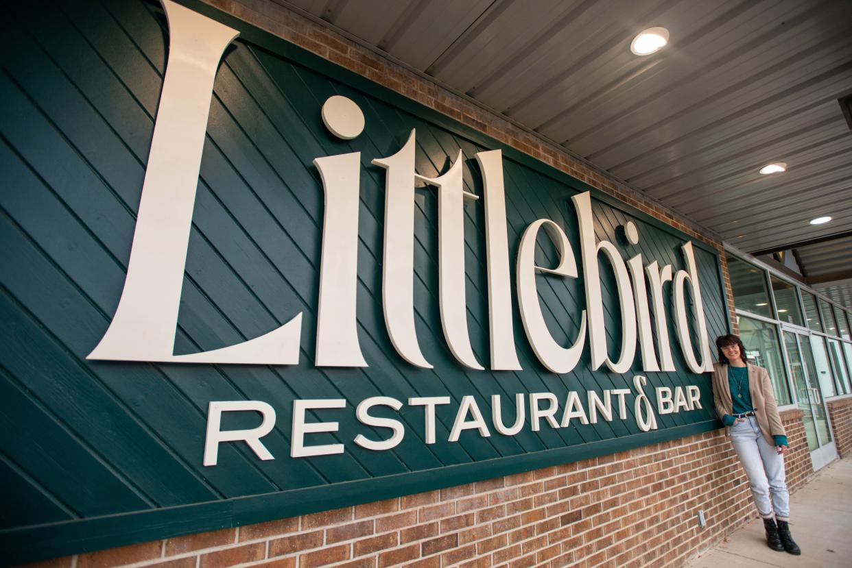 Littlebird owner Lauren Kail poses alongside her restaurant's sign outside located on 316 N Highland Ave, Jackson, Tenn., on Monday, Nov. 20, 2023.