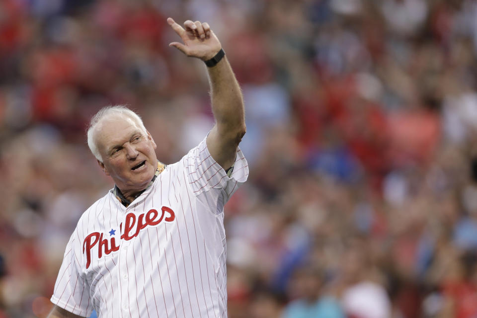FILE - In this Aug. 12, 2017, file photo, Philadelphia Phillies' Charlie Manuel waves to the crowd before a baseball game against the New York Mets in Philadelphia. The Phillies have hired former manager Charlie Manuel to replace John Mallee as hitting coach. Manuel was working as senior adviser to the general manager. The Phillies announced Tuesday, Aug. 13, 2019, that he would assume his new position for the remainder of the season. (AP Photo/Matt Slocum, File)
