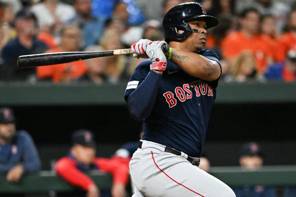 Sep 30, 2023; Baltimore, Maryland, USA; Boston Red Sox third baseman Rafael Devers (11) singles during the third inning against the Baltimore Orioles at Oriole Park at Camden Yards. Mandatory Credit: Tommy Gilligan-USA TODAY Sports