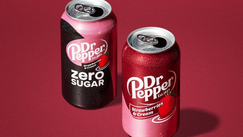 A regular can and a zero sugar can of Dr Pepper Strawberries & Cream