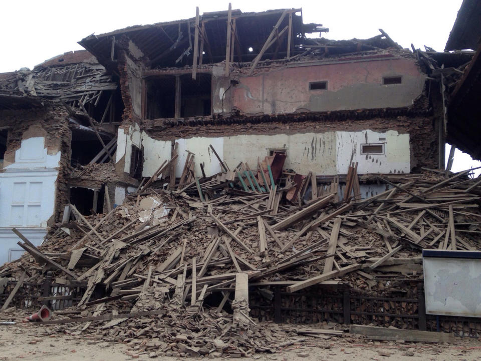 A building stands damaged, April 25, 2015. (AP Photo/ Niranjan Shrestha)