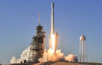 <p>A SpaceX Falcon 9 rocket lifts off from Kennedy Space Center (Rex features) </p>