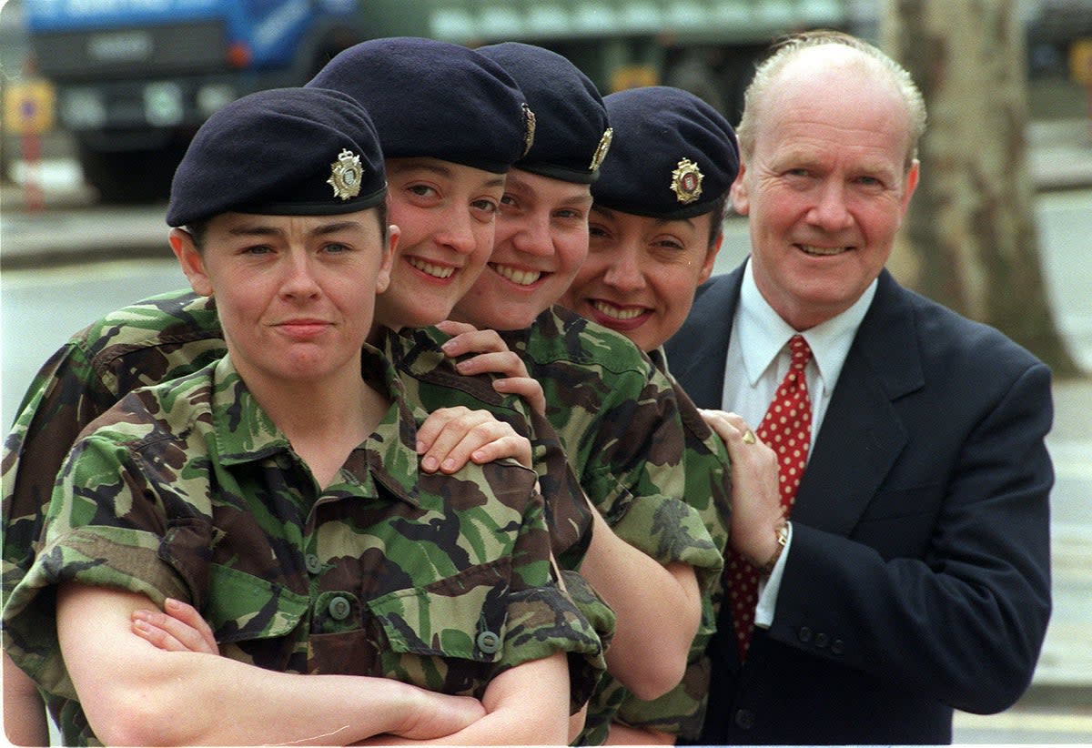 John Reid (right) during a photocall to launch a 2.5 million recruitment drive to encourage more women and members of the ethnic minorities to join the Army. (PA)