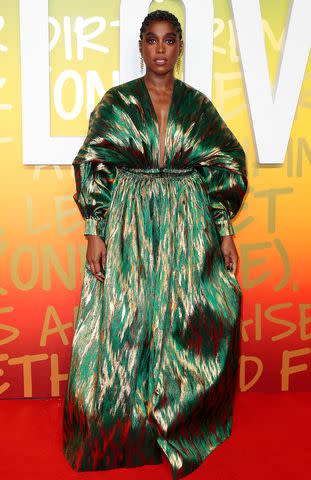 <p>John Phillips/Getty Images</p> Lashana Lynch attends the premiere of "Bob Marley: One Love" in London
