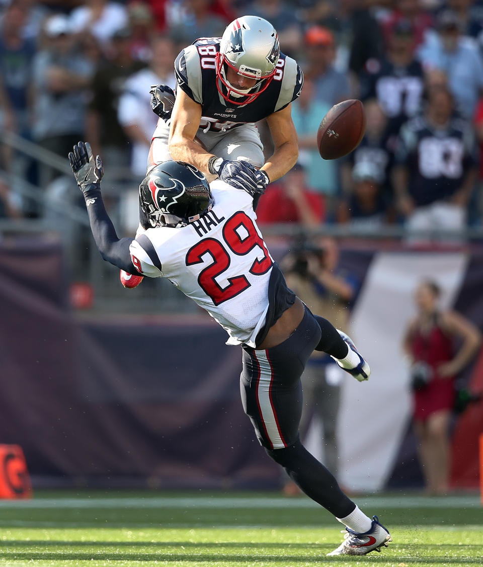 <p>New England Patriots Danny Amendola (80) is separated from a pass attempt by a hard hit from the Houston Texans Andre Hal (29) during a game at Gillette Stadium in Foxborough, Mass., Sept. 24, 2017. (Photo by Jim Davis/The Boston Globe via Getty Images) </p>