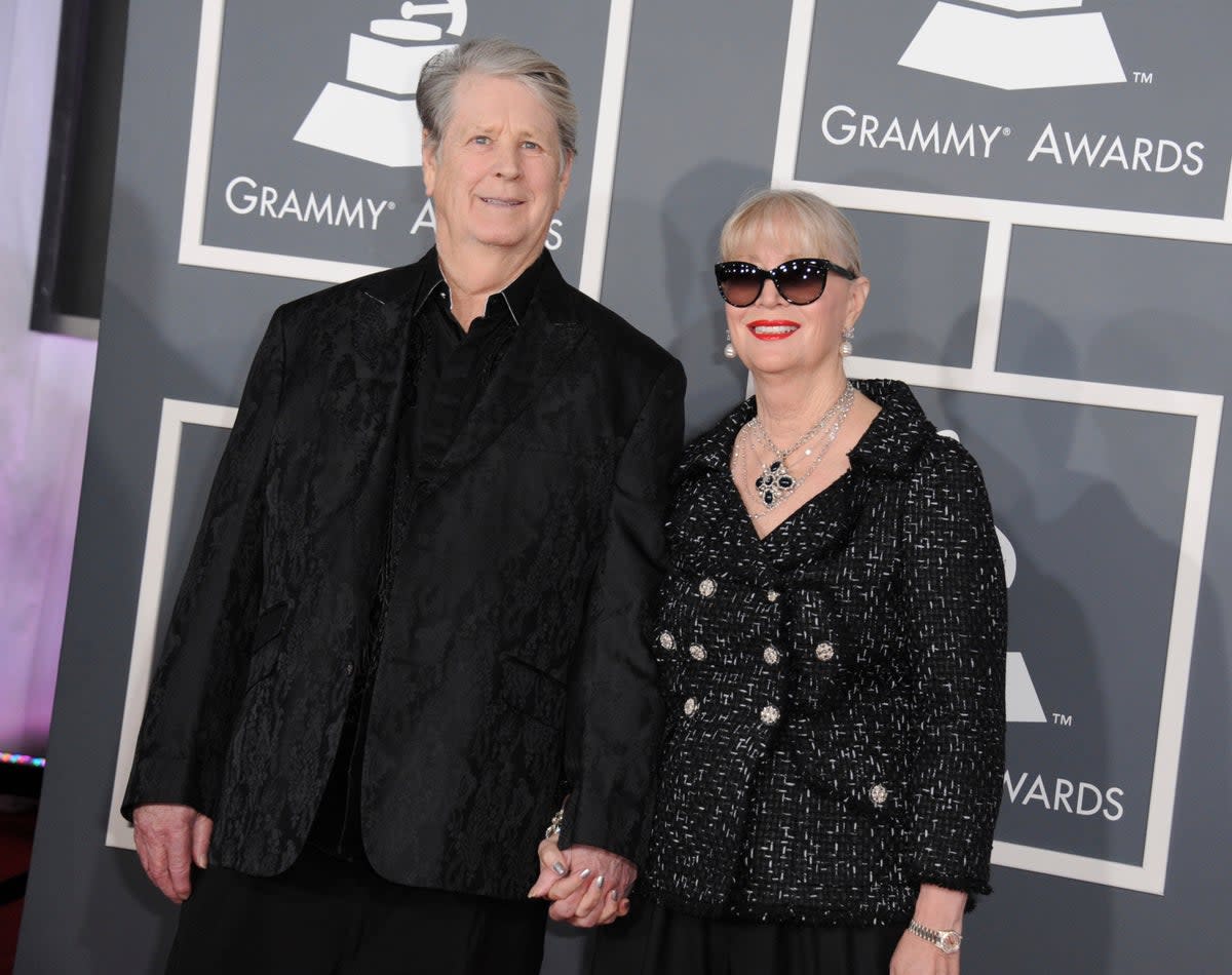 Musician Brian Wilson, left, and his wife Melinda Ledbetter Wilson at the Grammy’s in 2013 (Jordan Strauss/Invision/AP)
