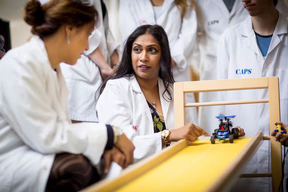 Dr Maria Parappilly with a Lego race car.