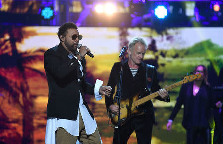 Shaggy and Sting perform during a special concert "The Queen's Birthday Party" to celebrate the 92nd birthday of Britain's Queen Elizabeth at the Royal Albert Hall in London, Britain April 21, 2018. Andrew Parsons/Pool via Reuters