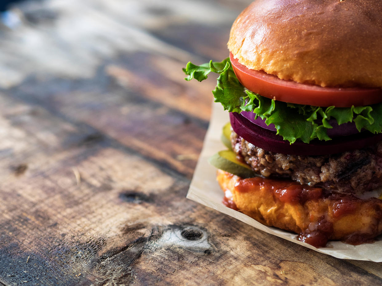 Burgerville, a West Coast restaurant chain, is offering back pay to disciplined employees. The workers say they were punished for unionizing. (Photo: Getty Images)