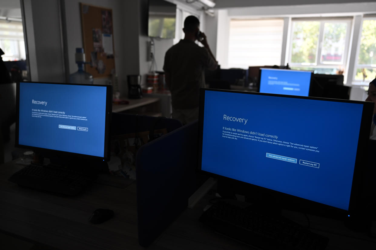 ANKARA, TURKIYE - JULY 19: In this photo illustration the blue screen of death errors on computer screens are viewed due to the global communications outage caused by CrowdStrike, which provides cyber security services to US technology company Microsoft, on July 19, 2024 in Ankara, Turkiye. (Photo by Harun Ozalp/Anadolu via Getty Images)