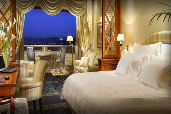 <div class="caption-credit"> Photo by: Rome Cavalieri Waldorf Astoria</div><div class="caption-title">6. Concierge-Level Deluxe With A View At Rome Cavalieri Waldorf Astoria In Italy</div><p> Perched high above the Eternal City and the dome of the Vatican sits a storied hotel that has been attracting the Jet Set since the '60s, thanks to frescoed public spaces, wandering gardens, an ultra pampering spa and La Pergola, the hotel's famed 3 Michelin star restaurant, which all offer spectacular views of Rome. Even more special are the hotel's concierge level suites, with deep soaking tubs and full-size Bulgari bath amenities, enormous beds that look out to the city and comfortable seating areas. The best part, however, are the rooms' wide, private balconies, which are the perfect setting for a morning coffee, an afternoon espresso and a prosecco toast at night. For more info, visit <a rel="nofollow noopener" href="http://www.bridalguide.com/planning/wedding-reception/fall-wedding-ideas" target="_blank" data-ylk="slk:romecavalieri.com;elm:context_link;itc:0;sec:content-canvas" class="link ">romecavalieri.com</a>. </p> <p> <b>Related: <a rel="nofollow noopener" href="http://www.bridalguide.com/honeymoons/europe/european-islands" target="_blank" data-ylk="slk:Top European Islands to Visit;elm:context_link;itc:0;sec:content-canvas" class="link ">Top European Islands to Visit</a></b> </p>