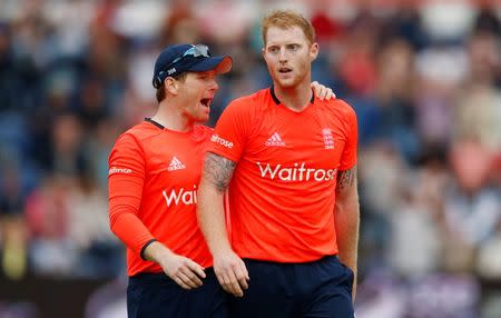 Cricket - England v Australia - NatWest International T20 - SSE SWALEC Stadium, Cardiff, Wales - 31/8/15 England's Ben Stokes (R) celebrates with Eoin Morgan after taking the wicket of Australia's Nathan Coulter Nile Action Images via Reuters / Andrew Boyers