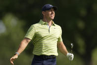 Rory McIlroy, of Northern Ireland, hits from the fairway on the 15th hole during the first round of the PGA Championship golf tournament Thursday, May 19, 2022, in Tulsa, Okla. (AP Photo/Eric Gay)