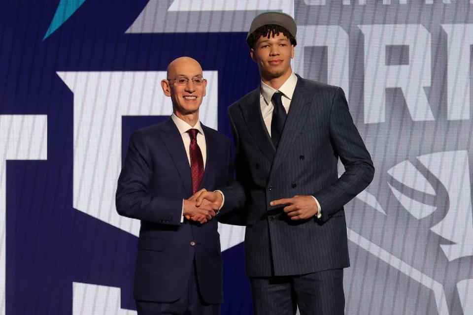 Tidjane Salaun poses for photos with NBA commissioner Adam Silver after being selected in Wednesday’s first round by the Charlotte Hornets in the 2024 NBA Draft at Barclays Center in New York.