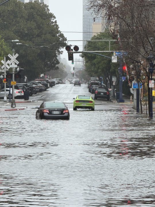 Downpour from storm drenches San Diego Road closures, outages and more