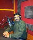 The multi-faceted anchor and engineer first ventured into the voice-over industry with the Hindi division of Voice of America, the US government funded international news and broadcast organisation. Shammi Narang, who was selected from among 10,000 applicants by DD, went on to become a household name in Indian television. Currently, apart from providing training to new anchors, Narang also does voice-overs, comperes shows and is the man behind the voice that you hear at the Delhi metro. Narang has also composed jingles for commericals such as Tata Tea and has appeared in films such as Makdee, Maqbool, Sultan, and No One Killed Jessica. <strong>Image credit:</strong> By STUDIOPINDROPDELHI - Clicked a picture in his studio, CC BY-SA 3.0, https://en.wikipedia.org/w/index.php?curid=38506208