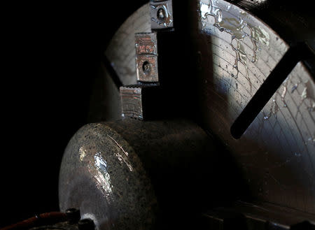 Granite is shaped on a lathe to make a curling stone in Kays Factory Mauchline, Scotland, Britain, January 11, 2018. REUTERS/Russell Cheyne