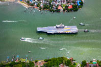 In this handout picture provided by the Indian Navy, INS Vikrant, India's first indigenously-built aircraft carrier, sails for sea trials from Kochi, India, Aug. 25, 2022. (Indian Navy via AP)