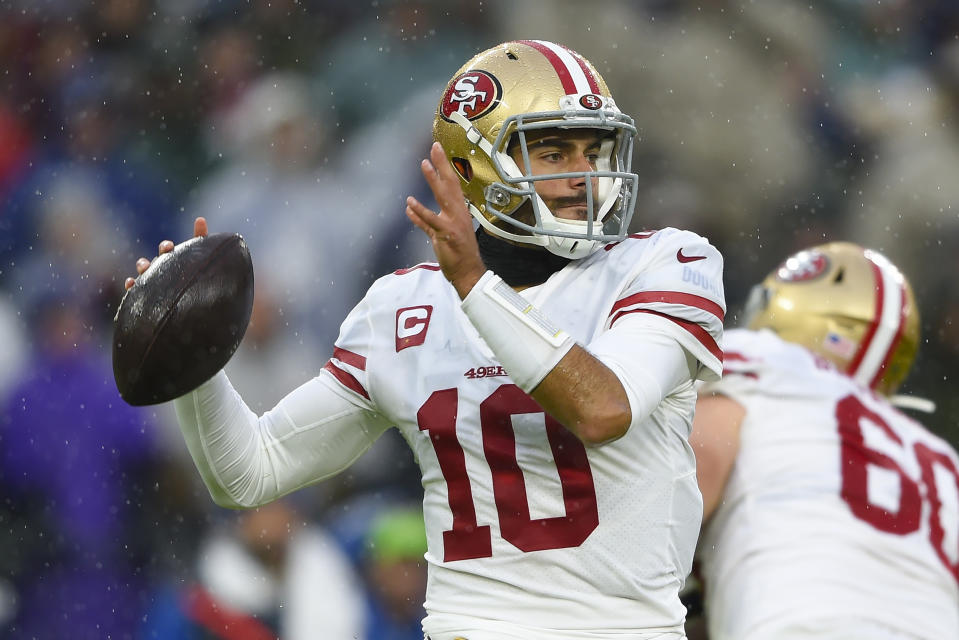 San Francisco 49ers quarterback Jimmy Garoppolo looks to pass the ball during the first half of an NFL football game against the Baltimore Ravens, Sunday, Dec. 1, 2019, in Baltimore, Md. (AP Photo/Gail Burton)