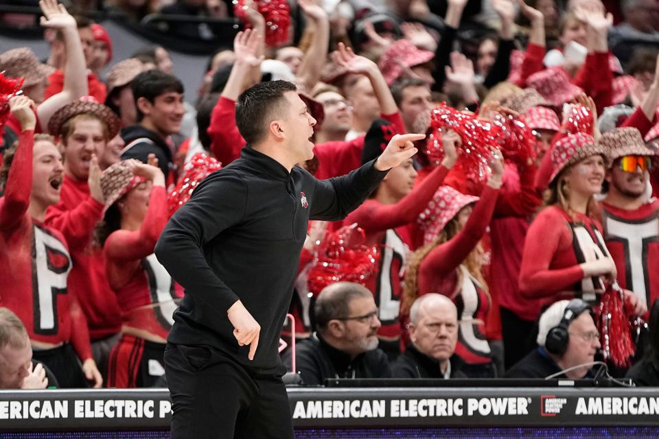 Feb 18, 2024; Columbus, Ohio, USA; Ohio State Buckeyes interim head coach Jake Diebler yells from the bench during the second half of the NCAA men’s basketball game against the Purdue Boilermakers at Value City Arena. Ohio State won 73-69.