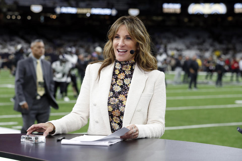 FILE - ESPN Monday Night Football commentator Suzy Kolber is seen before an NFL football game between the New Orleans Saints and the Baltimore Ravens, Monday, Nov. 7, 2022, in New Orleans. Jeff Van Gundy, Suzy Kolber, Jalen Rose and Steve Young are among roughly 20 ESPN commentators and reporters who were laid off on Friday, June 30, 2023, as part of job cuts by the network. (AP Photo/Tyler Kaufman, File)