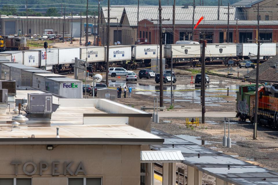 Local law enforcement officers control a crime scene after a Topeka police officer shot a man near the Amtrak Station on Aug. 24.