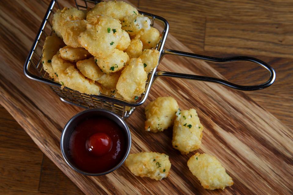 The goat cheese curds at Bleu Restaurant & Lounge in Ledgeview are locally sourced from LaClare Creamery in Malone and then lightly battered.