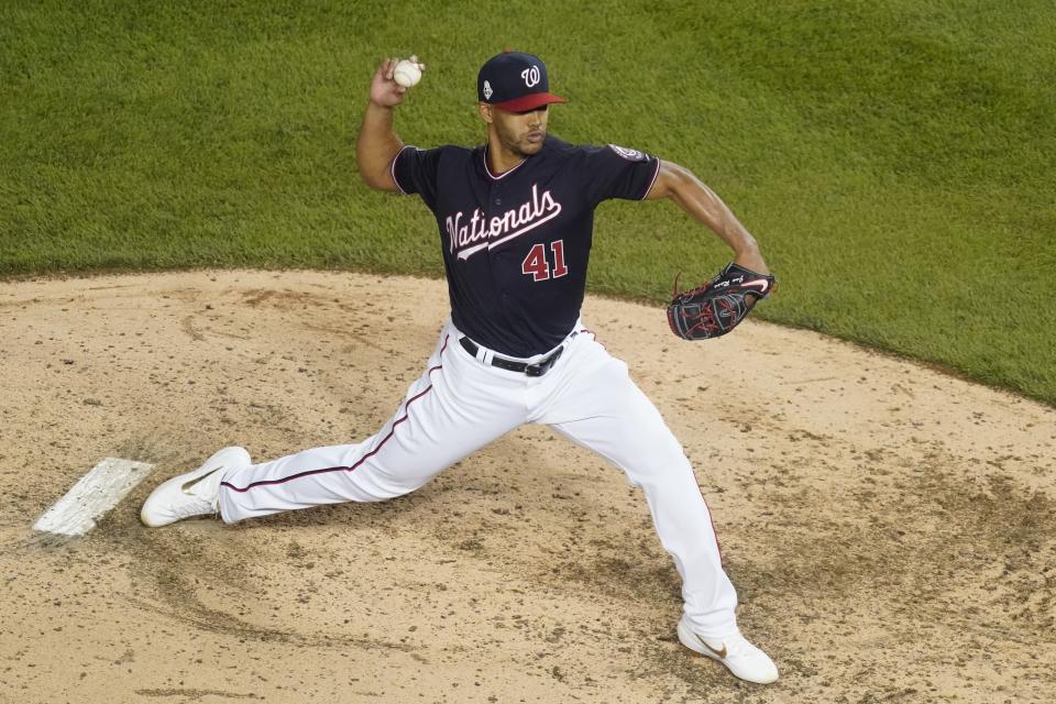 Washington Nationals reliever Joe Ross throws during the seventh inning of Game 3 of the baseball World Series against the Houston Astros Friday, Oct. 25, 2019, in Washington. (AP Photo/Pablo Martinez Monsivais)