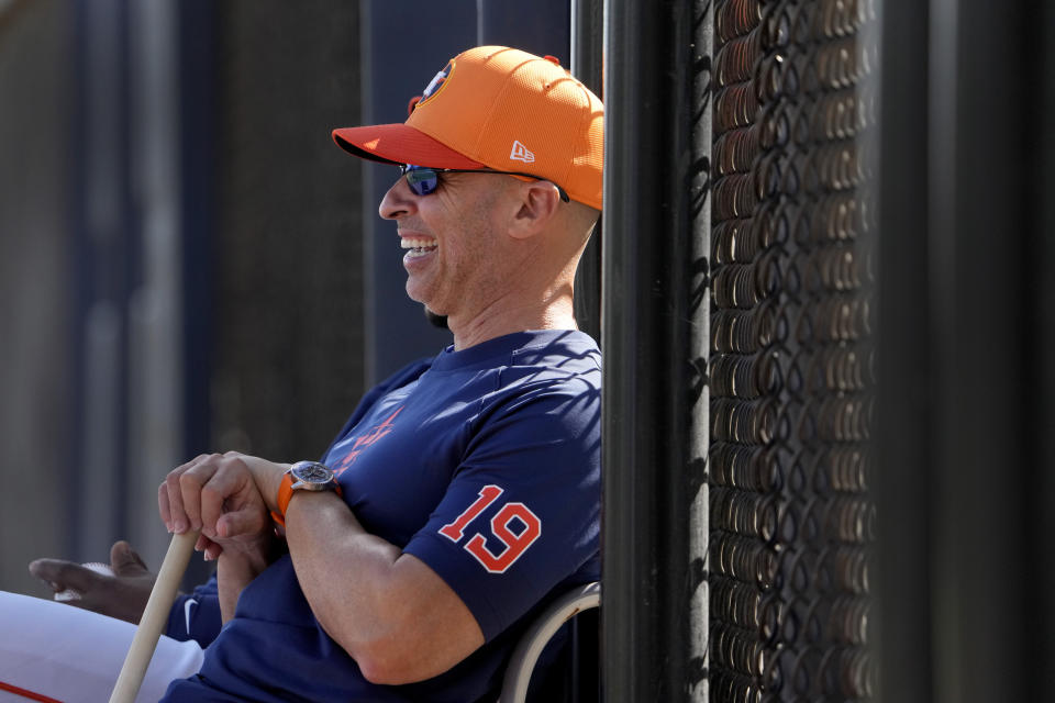 FILE - Houston Astros manager Joe Espada smiles as he watches his team during a spring training baseball workout Wednesday, Feb. 14, 2024, in West Palm Beach, Fla. Espada was an assistant for three managers who have won a World Series in Joe Girardi, A.J. Hinch and Dusty Baker before becoming a skipper for the first time after the Houston Astros hired him following Baker’s retirement this offseason.(AP Photo/Jeff Roberson, File)