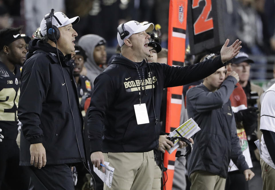 Purdue coach Jeff Brohm, center, yells from the sideline during the second half of the team’s Foster Farms Bowl NCAA college football game against Arizona on Wednesday, Dec. 27, 2017, in Santa Clara, Calif. (AP Photo/Marcio Jose Sanchez)
