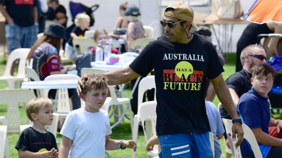 Seen here, Eddie Betts with two of his children.