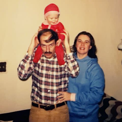 <p>Courtesy of J. Dana Trent</p> J. Dana Trent as a baby with her parents