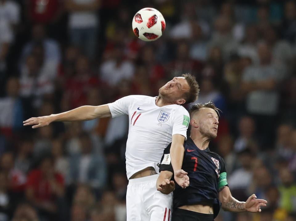 No luck: Jamie Vardy and Croatia’s Ivan Rakitic in mid-air