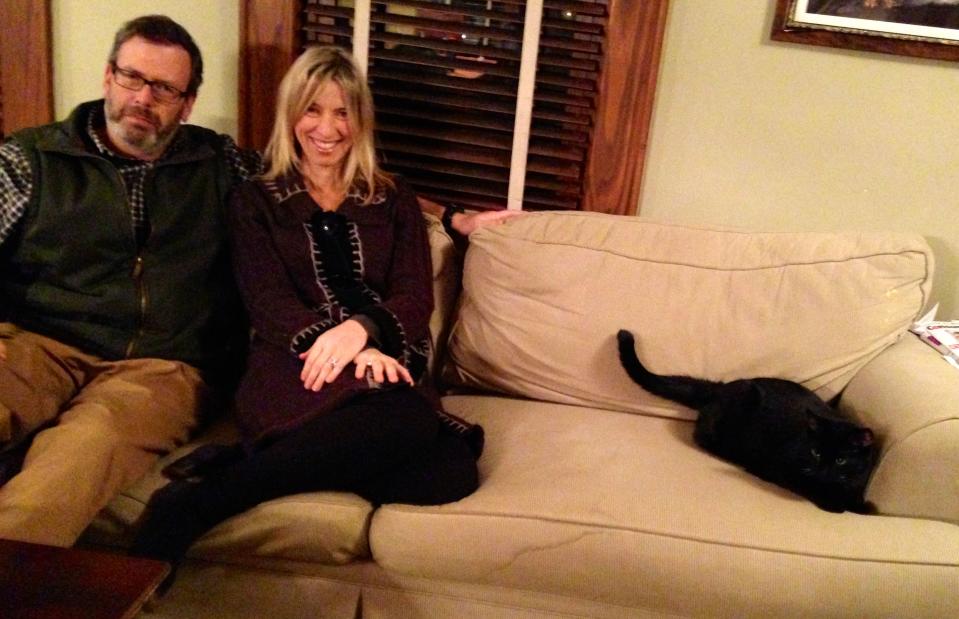 A light colored couch, three kids and a cat are a dangerous combination.