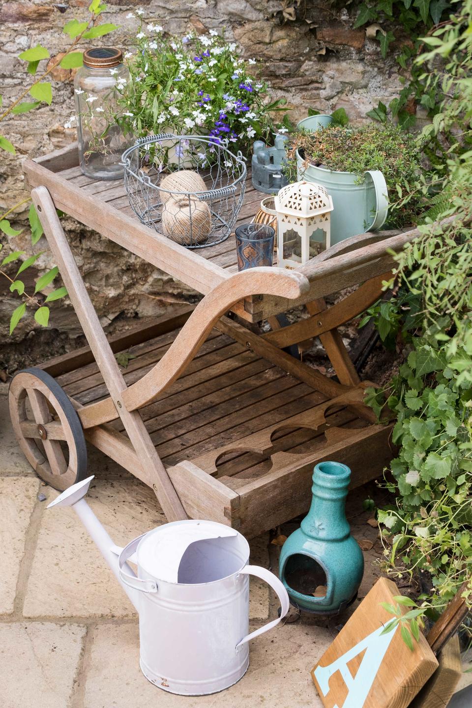 Use a wooden bar cart for a pretty vignette