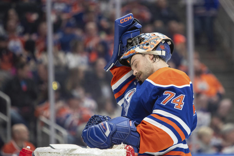 Edmonton Oilers goalie Stuart Skinner (74) reacts after a Winnipeg Jets goal during the first period of an NHL hockey game, Wednesday, Oct. 9, 2024 in Edmonton, Alberta. (Amber Bracken/Canadian Press via AP)