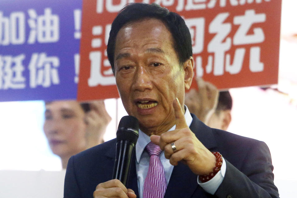 FILE - In this June 21, 2019, file photo, Terry Gou, chairman of Foxconn, the world's largest contract assembler of consumer electronics, speaks to the media after the company's annual shareholders meeting in New Taipei City, Taiwan. Gou has given up on making a bid for Taiwan's presidency. Gao announced his decision in a statement late Monday, Sept. 16, 2019, one day before a deadline to register for the race. (AP Photo/Chiang Ying-ying, File)