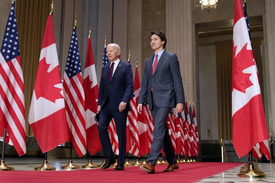 President Joe Biden and Canadian Prime Minister Justin Trudeau arrive for a news conference Friday, March 24, 2023, in Ottawa, Canada. (AP Photo/Andrew Harnik)