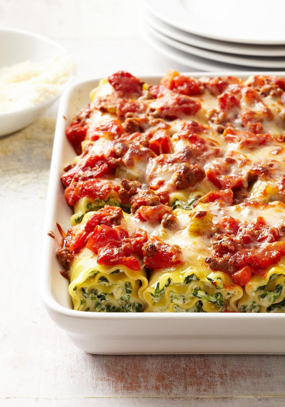 Lasagna is the perfect freezer meal. Make this rolled version with spinach on a rainy day to have on hand the next day your schedule is too busy to make dinner.