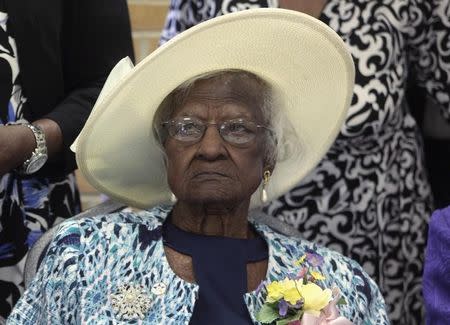 Jeralean Talley sits at the head table during a celebration of her 115th birthday at the New Jerusalem Missionary Baptist Church in Inkster, Michigan May 25, 2014. REUTERS/Rebecca Cook