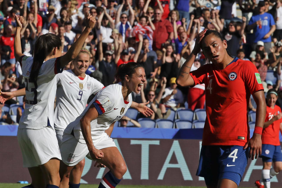 United States' Carli Lloyd, center, celebrates with teammates after scoring their side's third goal during the Women's World Cup Group F soccer match between United States and Chile at Parc des Princes in Paris, France, Sunday, June 16, 2019. (AP Photo/Alessandra Tarantino)