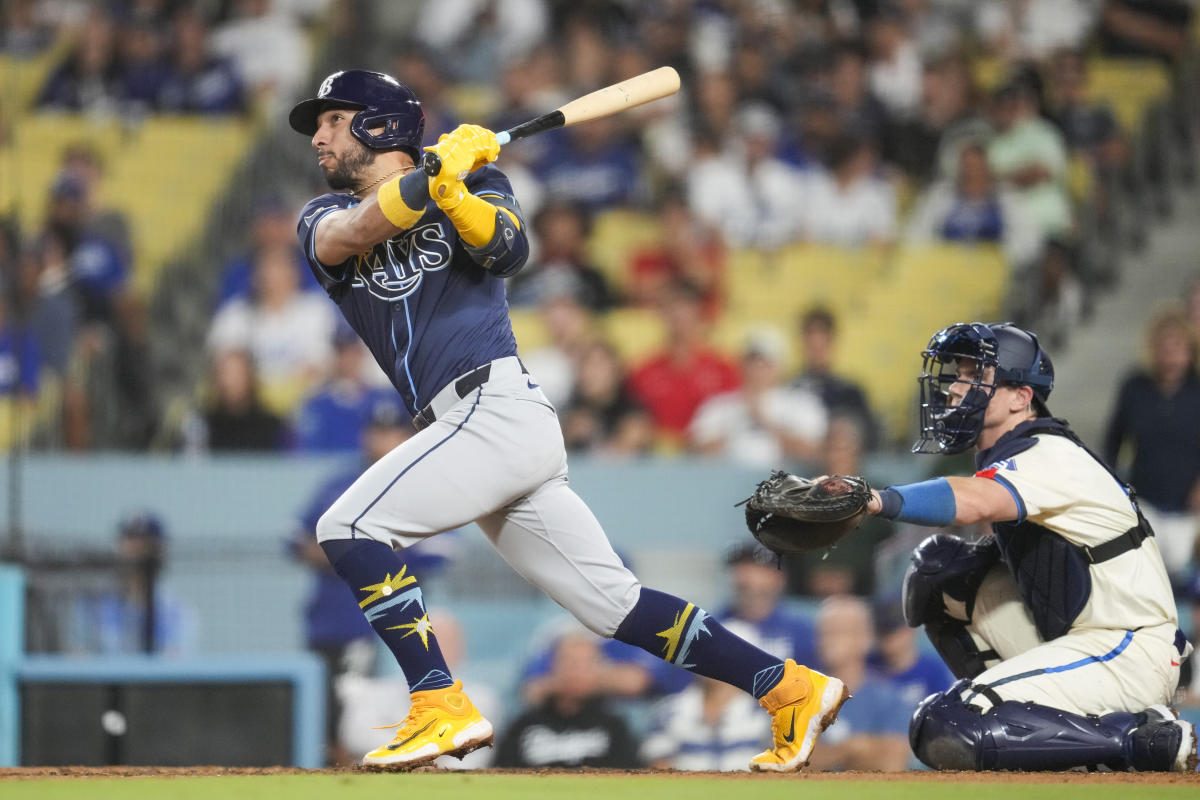 Caballero’s 2-run home run against Kelly in the 10th inning helps the Rays to a 9-8 victory over the Dodgers