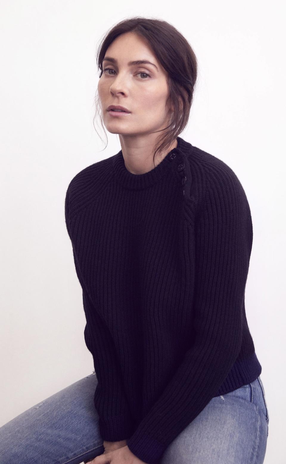Aliette Opheim in a two-color recycled- and organic-wool sweater.