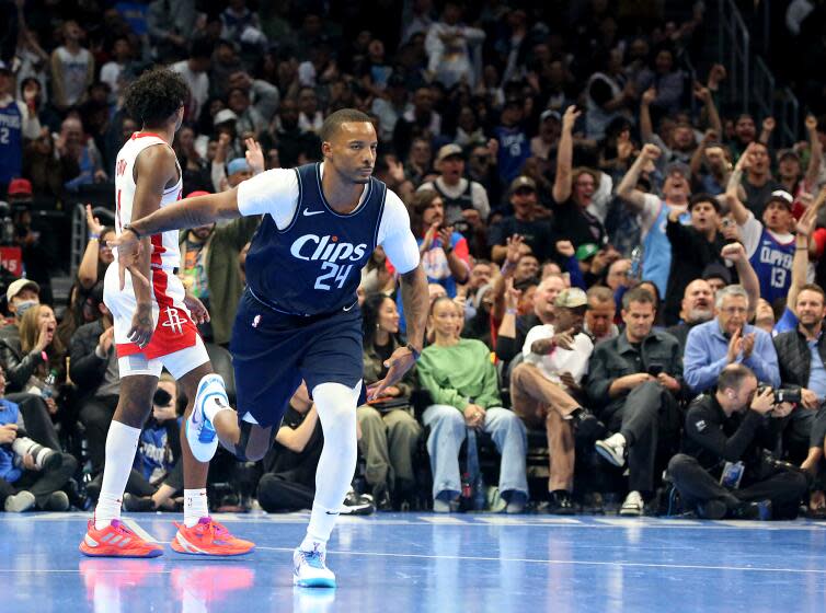 Clippers guard Norman Powell celebrates after hitting a three-pointer against the Rockets in a 106-100 victory.